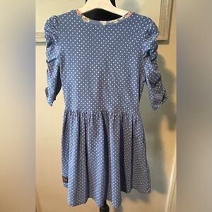 Blue polka dot dress.